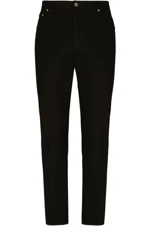 Dolce & Gabbana Logo-appliqué tapered-leg jeans