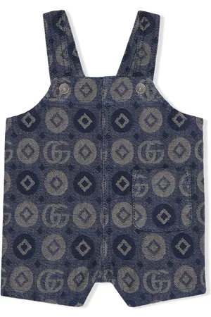 Gucci Monogram-pattern denim dungarees - Blue