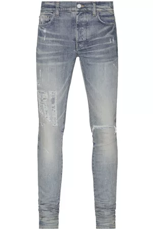 AMIRI Men Skinny Jeans - Distressed logo skinny jeans - Blue