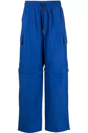 Maison Kitsuné Men Sweatpants - Water-resistant convertible track pants - Blue
