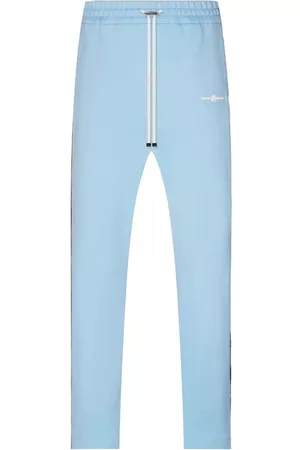 AMIRI Stripe-detail track pants - Blue