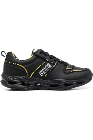 VERSACE Women Low Top & Lifestyle Sneakers - Logo-print low-top sneakers - Black