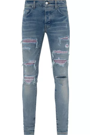 AMIRI Distressed skinny jeans - Blue