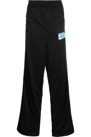 Vetements Wide Leg Pants - Logo-print wide-leg trousers - Black