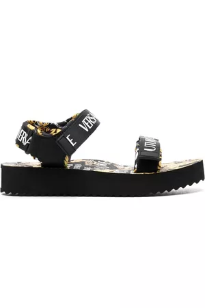 VERSACE Women Sandals - Touch-strap logo print sandals - Black