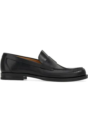 Salvatore Ferragamo Logo-embossed leather loafers