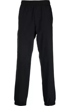 Moncler Men Pants - High-waisted tapered trousers - Black