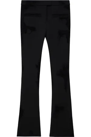 Courrèges Distressed-effect flared trousers