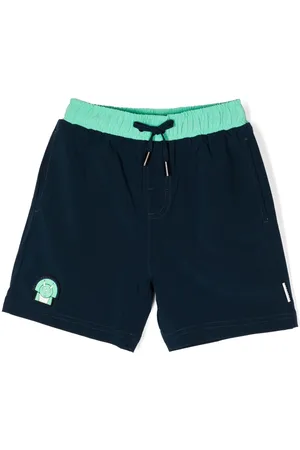 Roarsome Spike the Dinosaur swim shorts