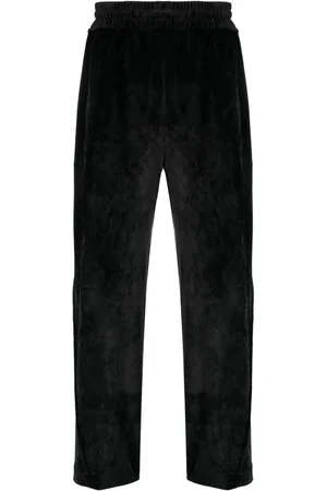 GCDS Logo-embroidered velvet trousers