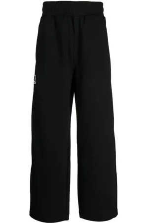 Izzue Logo-appliqué wide-leg trousers