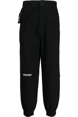 Izzue Logo-appliqué straight-leg trousers