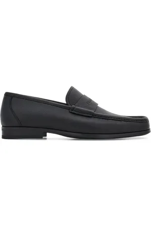 Salvatore Ferragamo Logo-debossed leather loafers