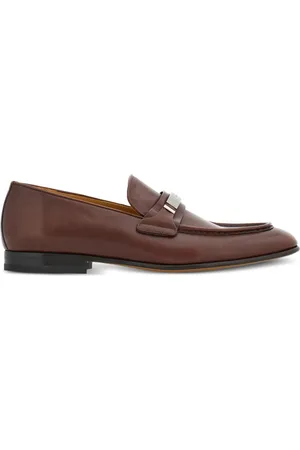 Salvatore Ferragamo Logo-engraved leather loafers