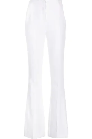 GENNY Iconic high-waist flared trousers