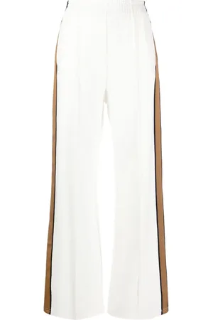 Lotus Milly flared sweatpants in beige - The Upside