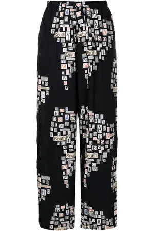 AMIR SLAMA Text-print straight-leg trousers