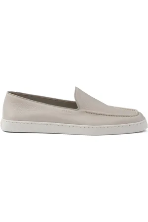 Prada Piped-trim leather loafers