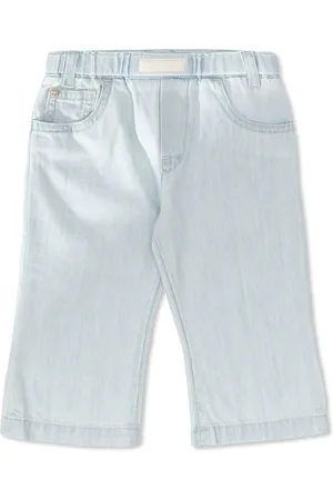 VERSACE Light-wash denim jeans