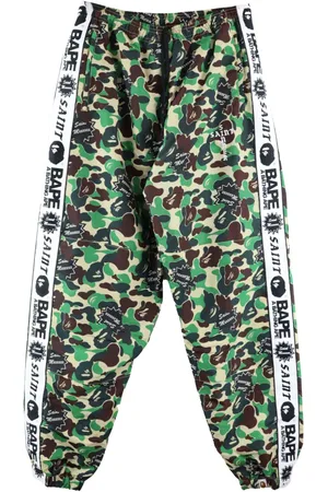 SAINT MXXXXXX Camouflage-print track pants