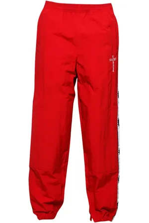 SAINT MXXXXXX Logo-tape track pants