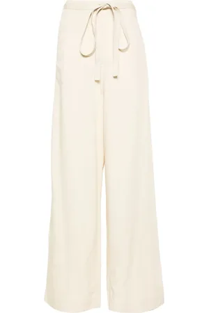 Totême Belted-waist flared trousers