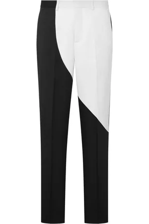 Moschino Two-tone tapered-leg trousers