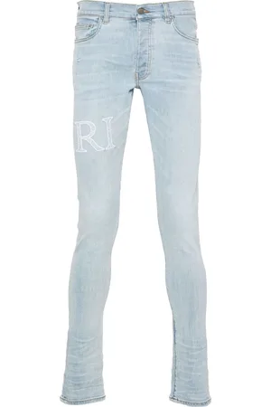 AMIRI Bandana-jacquard logo-appliqué jeans