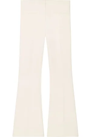 Courrèges Low-rise flared crepe trousers