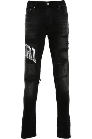 AMIRI Varsity Logo Repair jeans