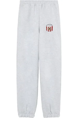 JOSHUA SANDERS Motif-embroidered tracn pants
