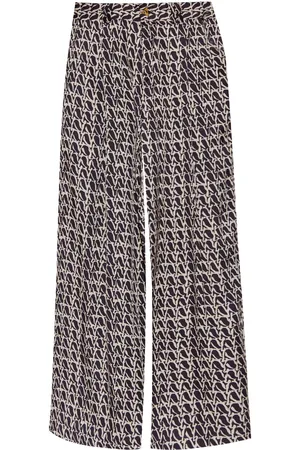 AERON Wellen monogram-print trousers