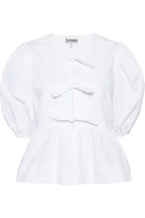 Ganni Cotton peplum tie blouse