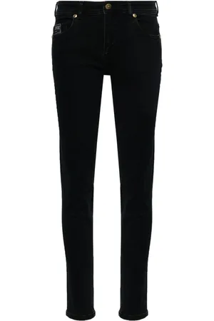 VERSACE Logo-plaque skinny jeans