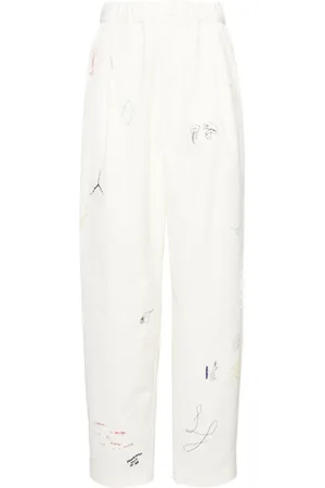 UNDERCOVER Sketch-style printed trousers