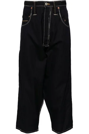 JUNYA WATANABE Pinstripe wool trousers