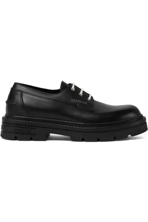 VERSACE Logo-lettering leather shoes