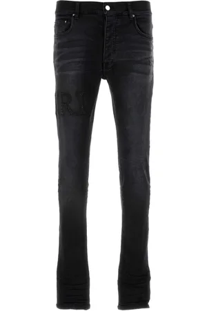 AMIRI Bandana-jacquard logo-appliqué jeans