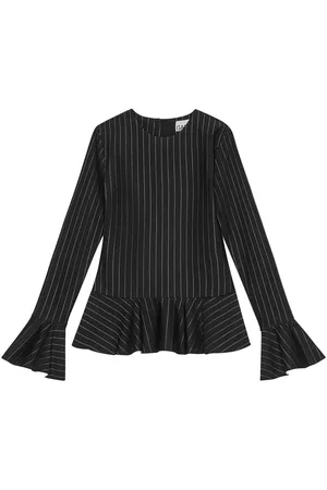 Ganni Pinstriped peplum blouse