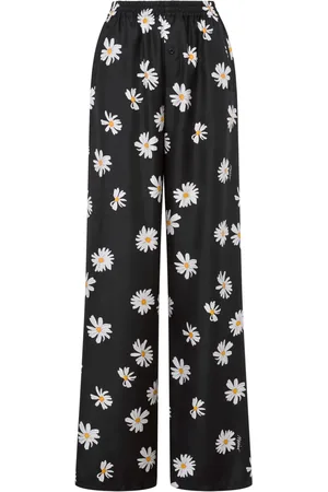 Moschino Daisy-print trousers