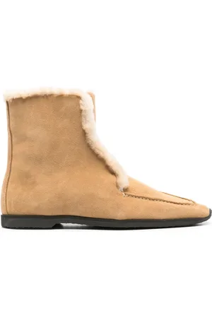 Totême Shearling-edge boots