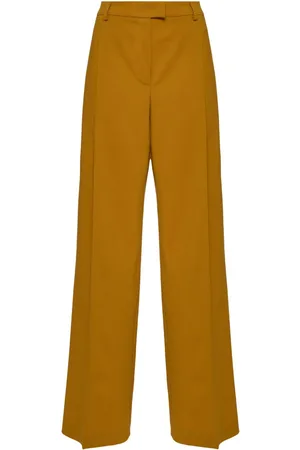 La DoubleJ Pressed-crease flared trousers