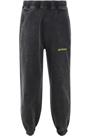 Les Benjamins Faded track pants