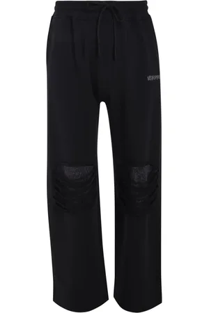 Les Benjamins Ripped track pants
