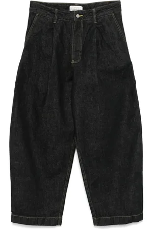 STUDIO NICHOLSON Pleated-detailing jeans