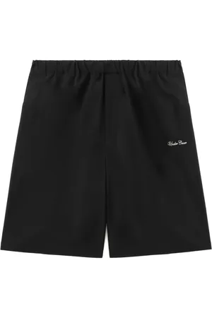 UNDERCOVER Text-print shorts