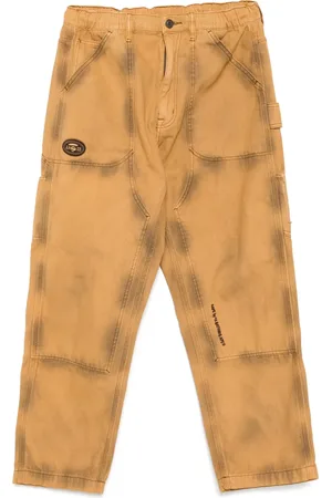 A Bathing Ape Moonface-logo washed jeans