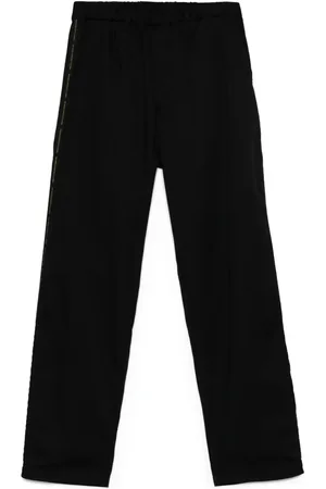 UNDERCOVER Logo tape-detail trousers
