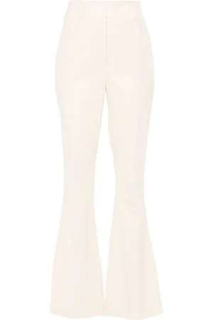 GENNY Crinkled-finish flared trousers
