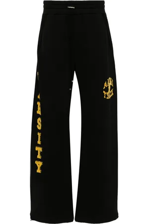 AMIRI Flocked-logo cotton track pants